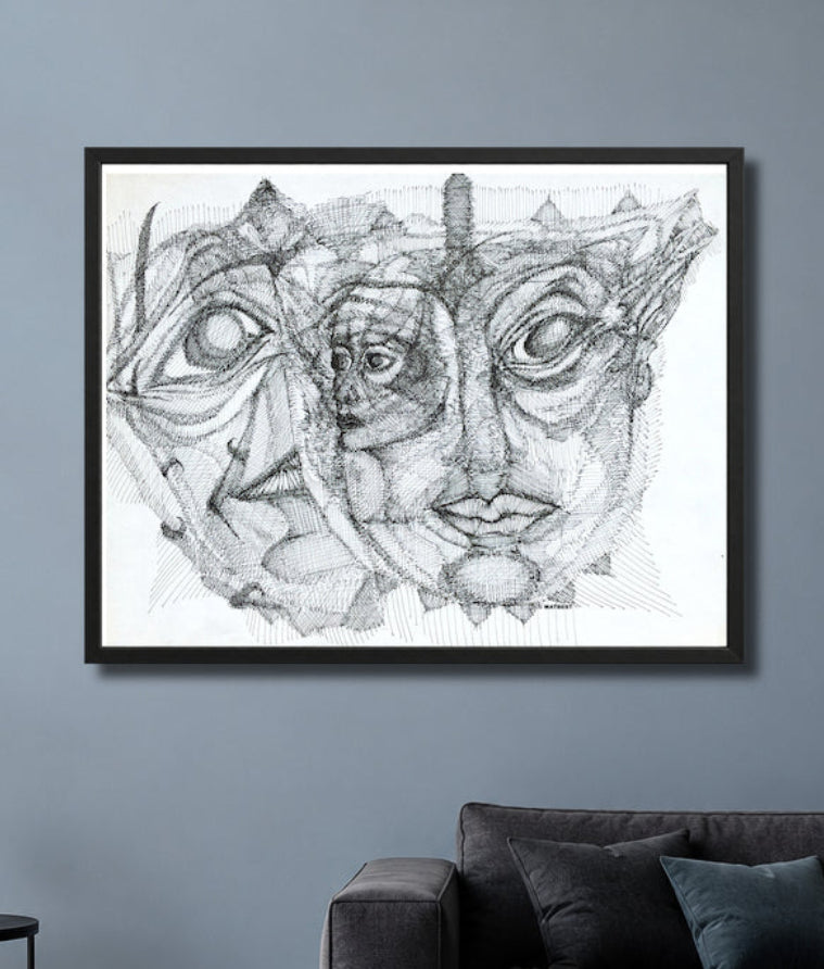 Personalities.MatiArtBox printable wall art mockup showing a framed black-and-white hand-drawn artwork above a dark gray sofa in a modern blue-gray living room.  