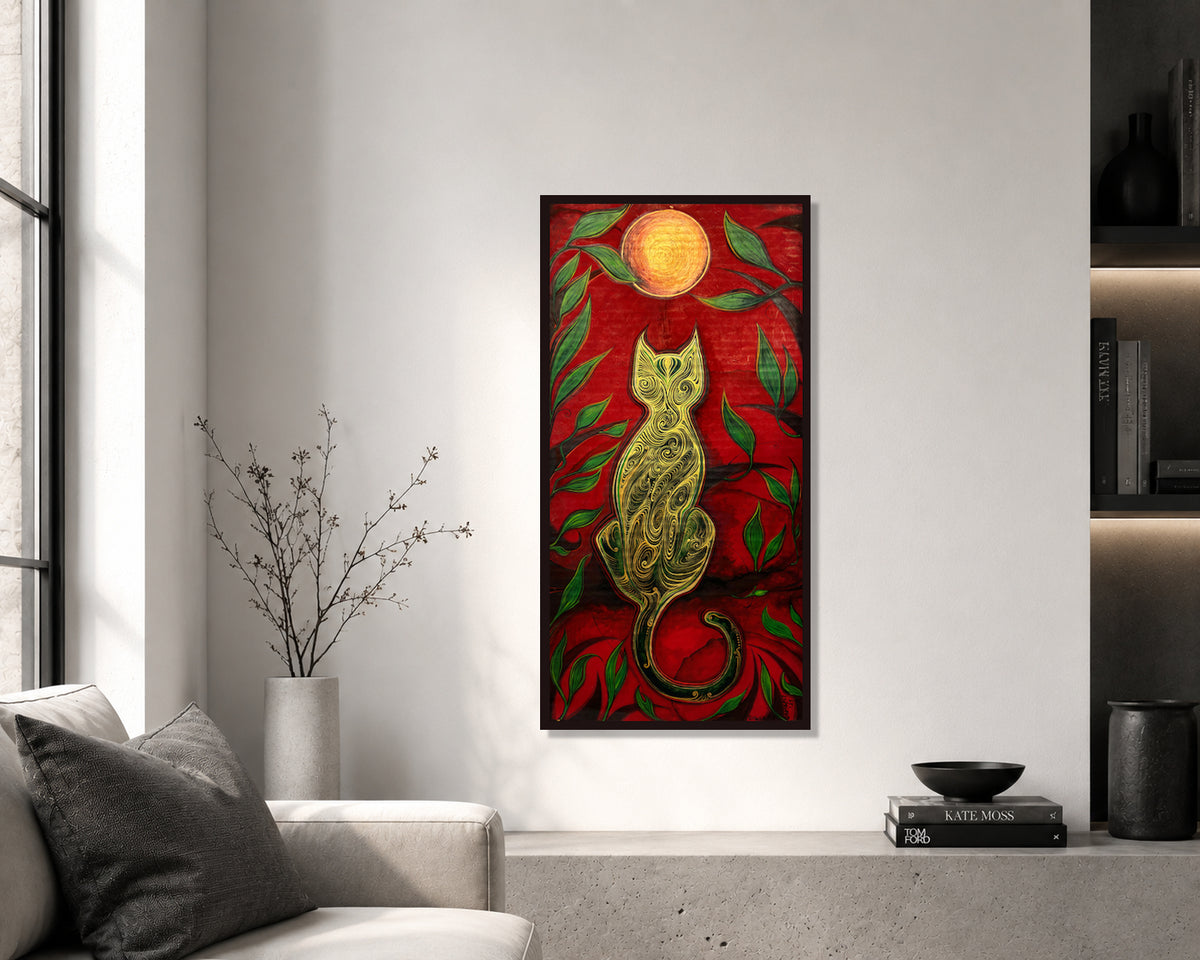The Green Cat and the Golden Moon artwork by MatiArtBox displayed in a dark frame on a white wall above a console in a modern minimalist living room.